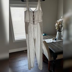 Baileys blossoms White and black striped jumpsuit